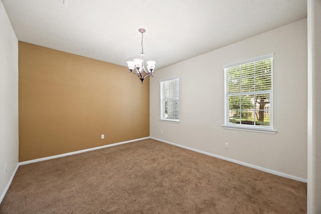 16606 River Wood Ct, Crosby, TX 77532 - unfurnished room featuring a chandelier and carpet