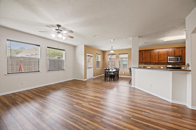 16606 River Wood Ct, Crosby, TX 77532 - living room with wood finished floors and a ceiling fan