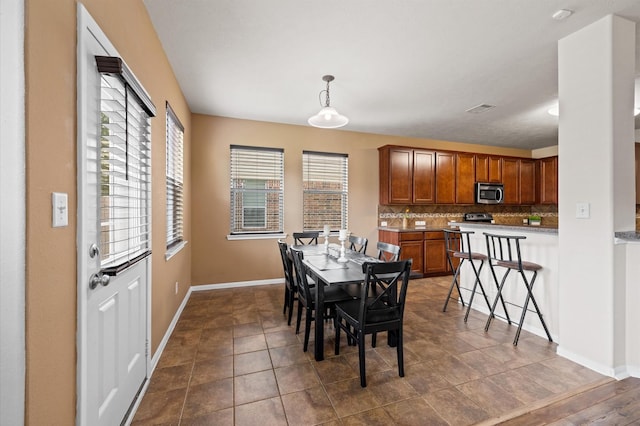 16606 River Wood Ct, Crosby, TX 77532 - dining room featuring baseboards