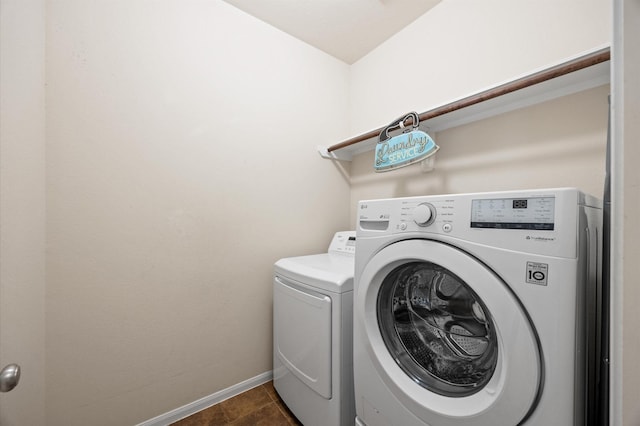 16606 River Wood Ct, Crosby, TX 77532 - laundry area featuring washer and dryer and baseboards