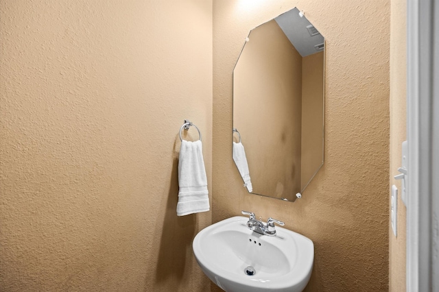 16606 River Wood Ct, Crosby, TX 77532 - bathroom with a sink and a textured wall
