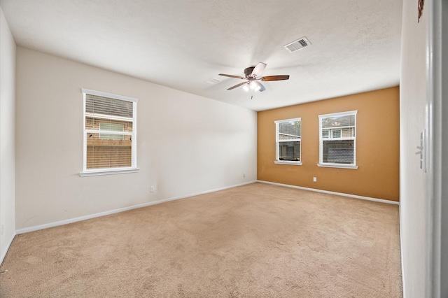 16606 River Wood Ct, Crosby, TX 77532 - spare room with carpet floors and a ceiling fan