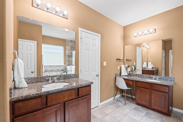 16606 River Wood Ct, Crosby, TX 77532 - full bath featuring a stall shower, two vanities, and tile patterned floors