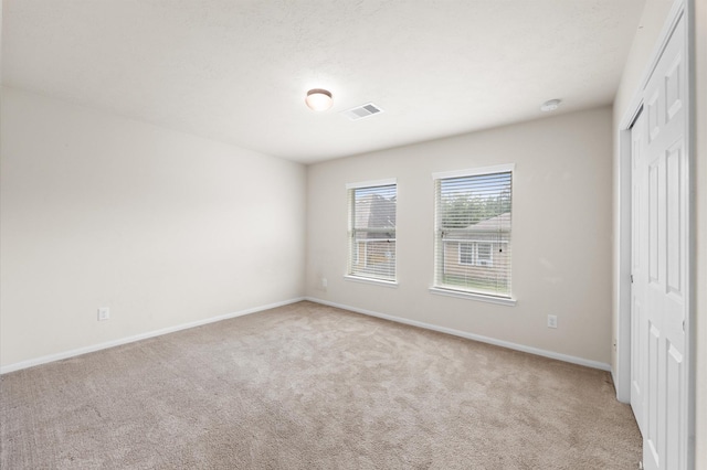 16606 River Wood Ct, Crosby, TX 77532 - unfurnished bedroom featuring a closet and carpet