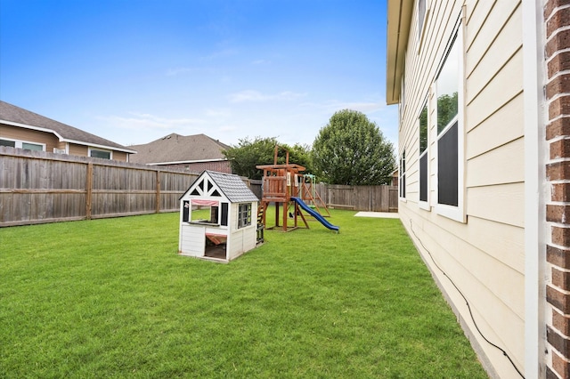 16606 River Wood Ct, Crosby, TX 77532 - fenced backyard with a playground