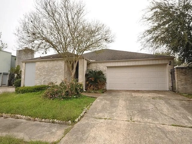 7822 Albin Ln, Houston, TX 77071 - view of front of home featuring driveway, an attached garage, and brick siding