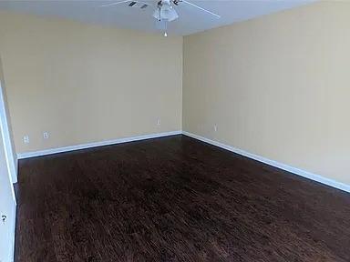 7822 Albin Ln, Houston, TX 77071 - unfurnished room with a ceiling fan and baseboards