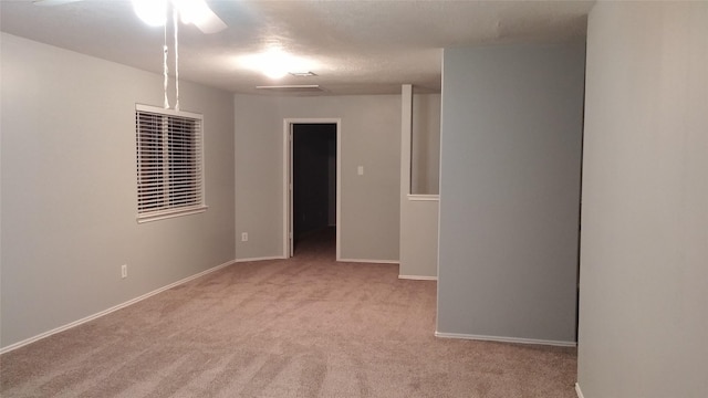 18438 Atascocita Meadow Dr, Humble, TX 77346 - spare room featuring light colored carpet and a ceiling fan