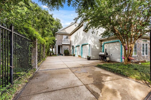 3039 Bayshore Dr, Bacliff, TX 77518 - view of front facade with driveway and an attached garage