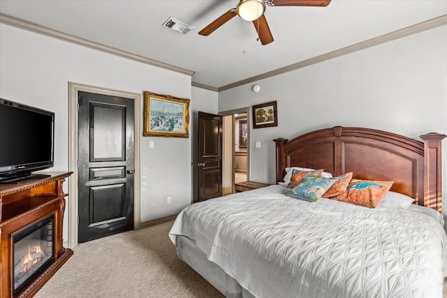 3039 Bayshore Dr, Bacliff, TX 77518 - carpeted bedroom with ornamental molding, a ceiling fan, and a glass covered fireplace