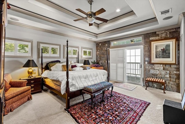 3039 Bayshore Dr, Bacliff, TX 77518 - bedroom featuring light colored carpet, a raised ceiling, crown molding, access to outside, and multiple windows