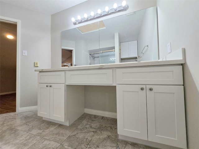 8100 Cambridge St Unit 99, Houston, TX 77054 - bathroom featuring vanity, marble finish floors, and an enclosed shower