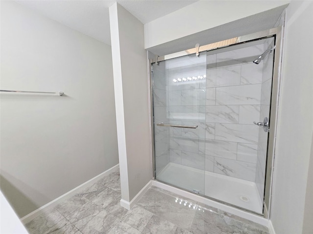 8100 Cambridge St Unit 99, Houston, TX 77054 - full bathroom with a shower stall and marble finish floors
