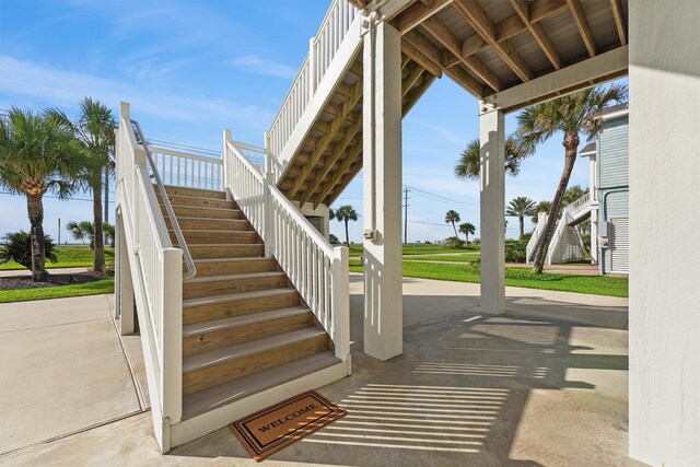 19623 Shores Dr, Galveston, TX 77554 - view of patio featuring stairway