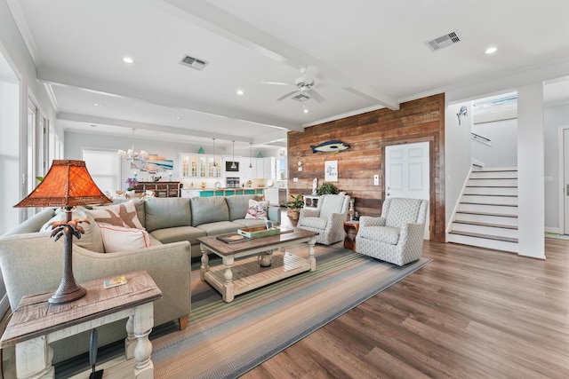 19623 Shores Dr, Galveston, TX 77554 - living room with wooden walls, stairway, a ceiling fan, wood finished floors, and recessed lighting
