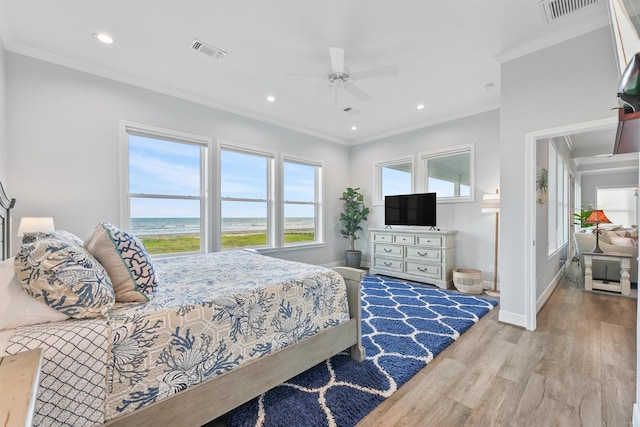 19623 Shores Dr, Galveston, TX 77554 - bedroom featuring wood finished floors, multiple windows, ornamental molding, recessed lighting, and a ceiling fan