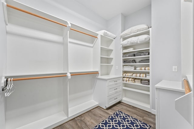 19623 Shores Dr, Galveston, TX 77554 - walk in closet featuring wood finished floors