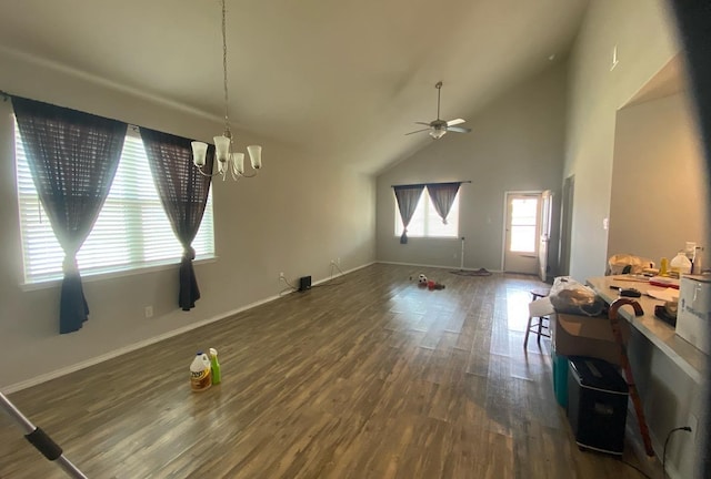 6138 Lillybelle St, Katy, TX 77449 - unfurnished dining area with dark wood-type flooring, a chandelier, ceiling fan, and high vaulted ceiling