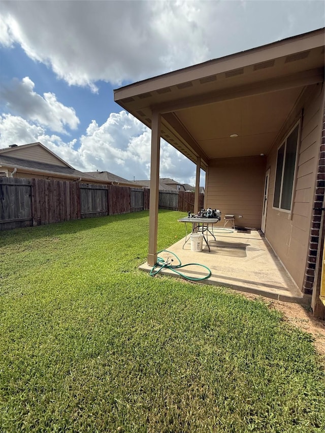 6138 Lillybelle St, Katy, TX 77449 - fenced backyard with a patio