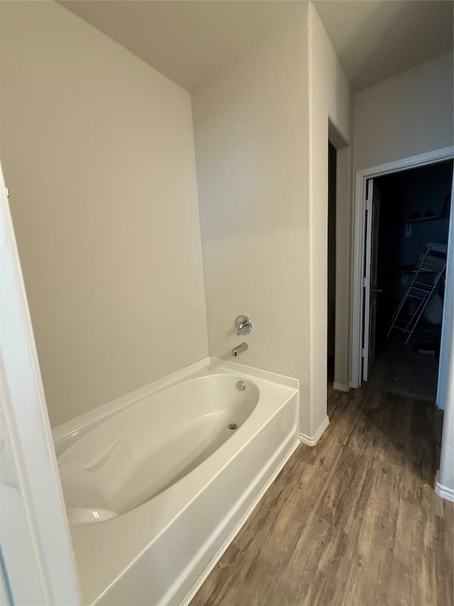 6138 Lillybelle St, Katy, TX 77449 - full bathroom featuring a bath and wood finished floors