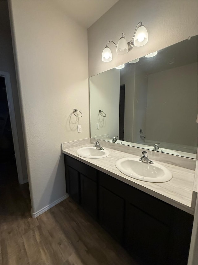 6138 Lillybelle St, Katy, TX 77449 - full bath with wood finished floors and double vanity