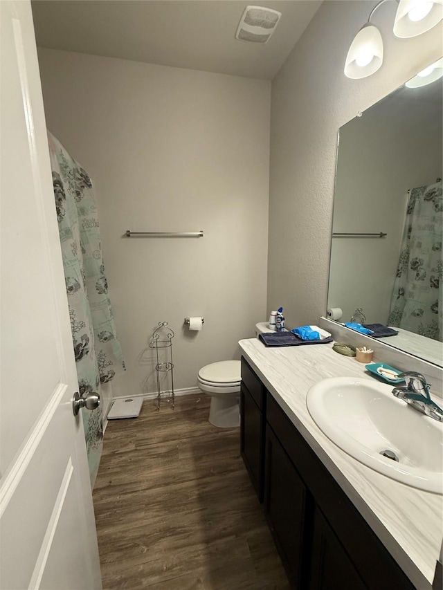 6138 Lillybelle St, Katy, TX 77449 - full bathroom featuring wood finished floors, vanity, and a shower with curtain