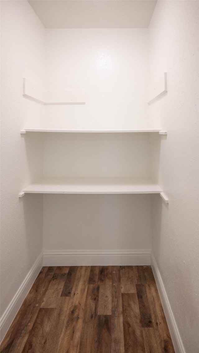 238 Almond Dr, Lake Jackson, TX 77566 - spacious closet with wood finished floors