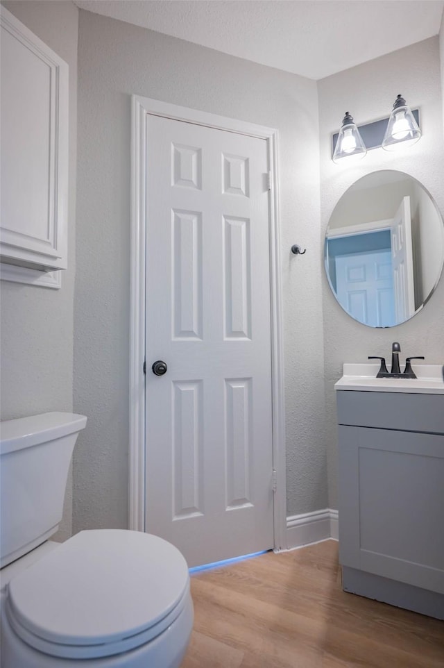 238 Almond Dr, Lake Jackson, TX 77566 - bathroom with vanity and wood finished floors