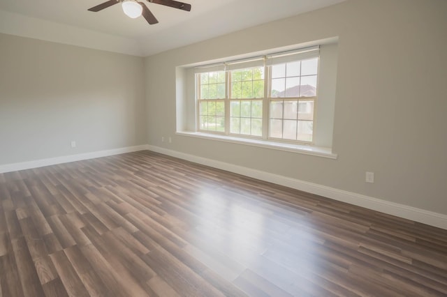 238 Almond Dr, Lake Jackson, TX 77566 - spare room with dark wood finished floors, a ceiling fan, and lofted ceiling