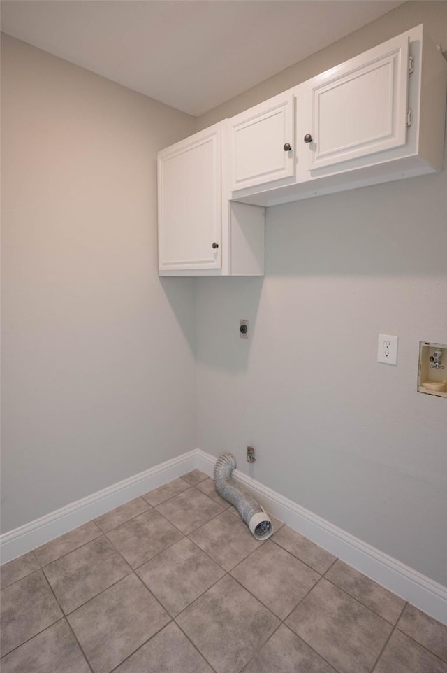 238 Almond Dr, Lake Jackson, TX 77566 - laundry room with cabinet space, electric dryer hookup, light tile patterned flooring, and hookup for a washing machine