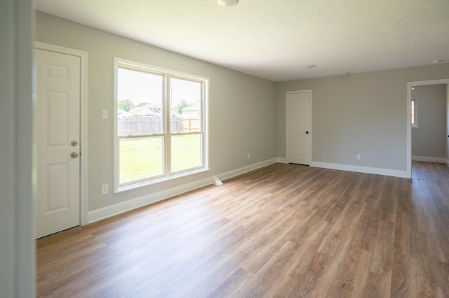 238 Almond Dr, Lake Jackson, TX 77566 - unfurnished room with wood finished floors and baseboards