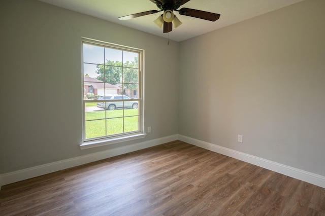 238 Almond Dr, Lake Jackson, TX 77566 - spare room featuring wood finished floors and a ceiling fan