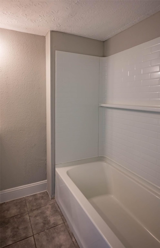 238 Almond Dr, Lake Jackson, TX 77566 - bathroom featuring tile patterned floors and a textured ceiling