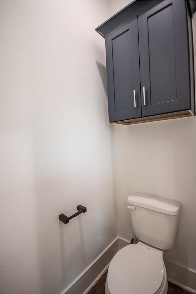 3314 Arbor St, Houston, TX 77004 - bathroom featuring baseboards and wood finished floors