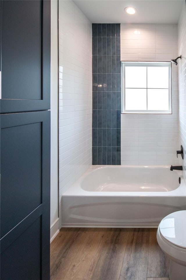 3314 Arbor St, Houston, TX 77004 - full bathroom with wood finished floors and tub / shower combination