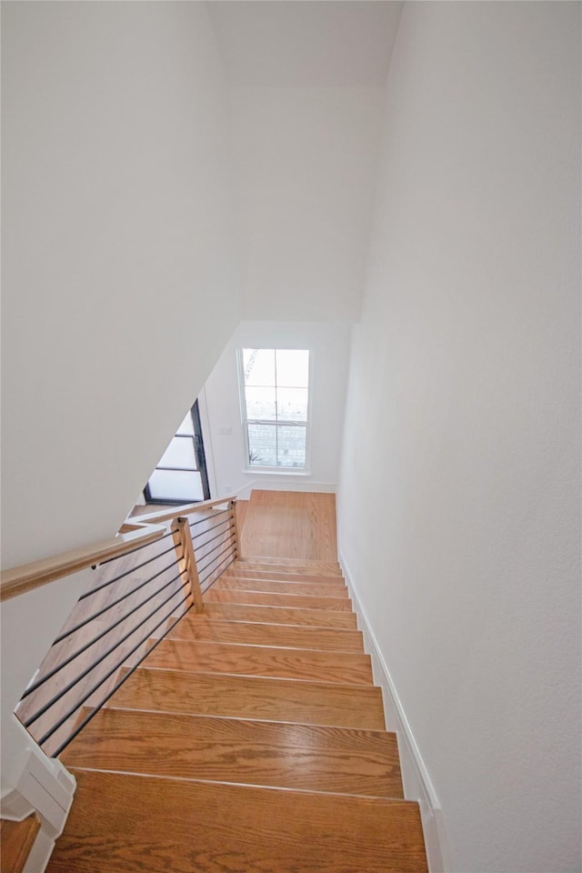 3314 Arbor St, Houston, TX 77004 - stairway with wood finished floors and vaulted ceiling