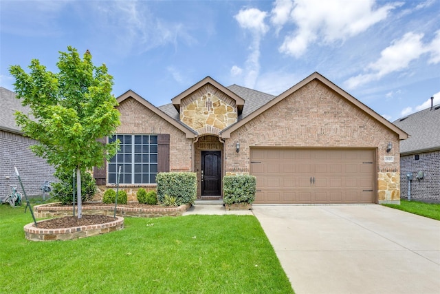 2821 Redbud Ln, Melissa, TX 75454 - view of front of house with stone siding, an attached garage, a front yard, concrete driveway, and brick siding