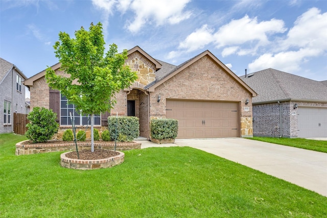 2821 Redbud Ln, Melissa, TX 75454 - view of front of house featuring a garage, a front lawn, concrete driveway, and stone siding