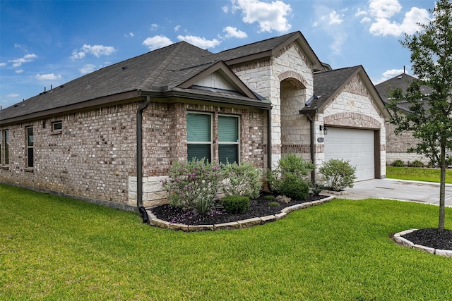 5311 Latigo Ct, Alvin, TX 77511 - french country style house with brick siding, a garage, driveway, a shingled roof, and a front yard