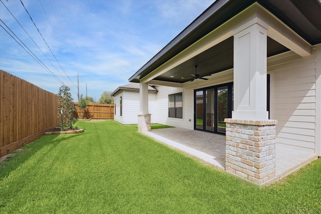 3312 Arbor St, Houston, TX 77004 - fenced backyard featuring a patio and a ceiling fan