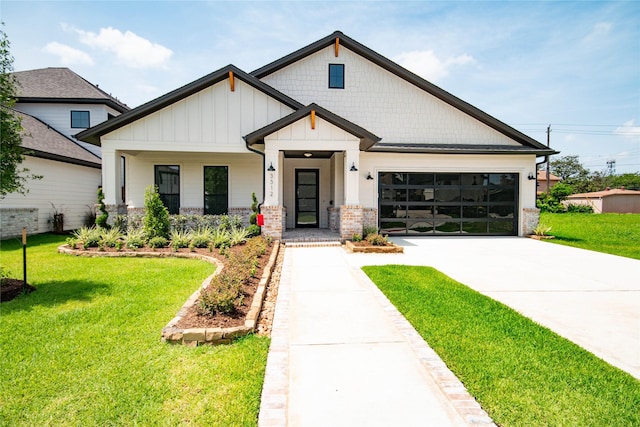 3312 Arbor St, Houston, TX 77004 - modern farmhouse with board and batten siding, driveway, a front lawn, and an attached garage