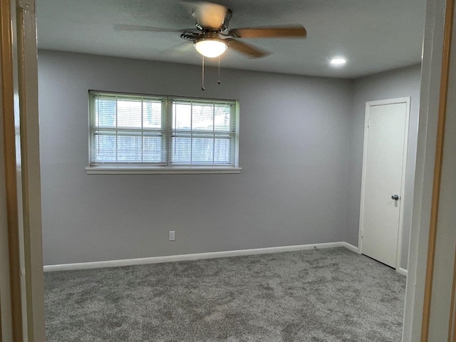 2202 Mockingbird Ln, Baytown, TX 77520 - spare room featuring carpet and ceiling fan