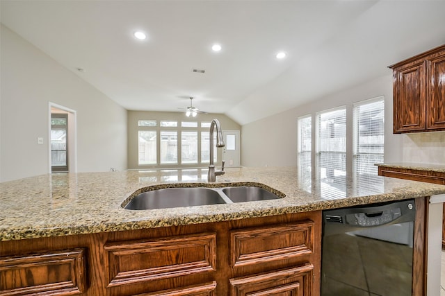 2531 Llano Springs Dr, Katy, TX 77494 - kitchen with dishwasher, ceiling fan, vaulted ceiling, light stone counters, and healthy amount of natural light