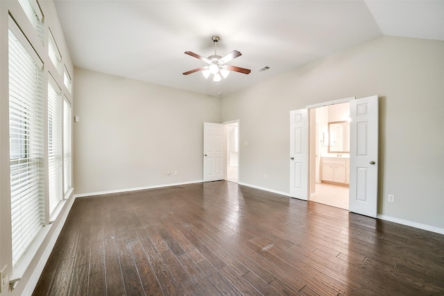 2531 Llano Springs Dr, Katy, TX 77494 - unfurnished bedroom with dark wood-style flooring and ensuite bath