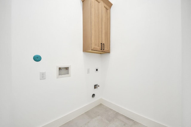 1913 W St, Houston, TX 77026 - washroom featuring hookup for an electric dryer, cabinet space, and washer hookup