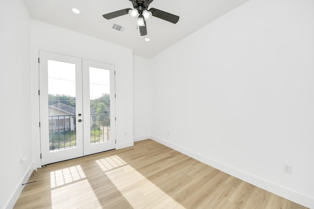 1913 W St, Houston, TX 77026 - spare room featuring light wood-type flooring, french doors, ceiling fan, and recessed lighting