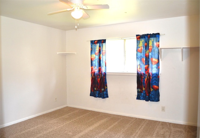 101 Summit Dr, Conroe, TX 77303 - carpeted empty room with ceiling fan and baseboards