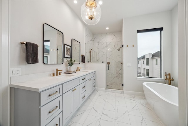 824 Wakefield Dr Unit A, Houston, TX 77018 - full bath with marble finish floors, a marble finish shower, a freestanding tub, double vanity, and recessed lighting