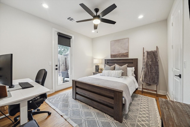824 Wakefield Dr Unit A, Houston, TX 77018 - bedroom with access to outside, an office area, wood finished floors, recessed lighting, and ceiling fan