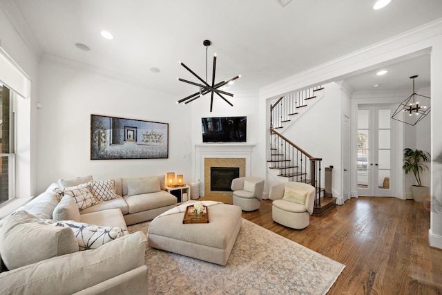 8421 Moritz Grn, Houston, TX 77055 - living area featuring a chandelier, stairs, recessed lighting, ornamental molding, and wood finished floors
